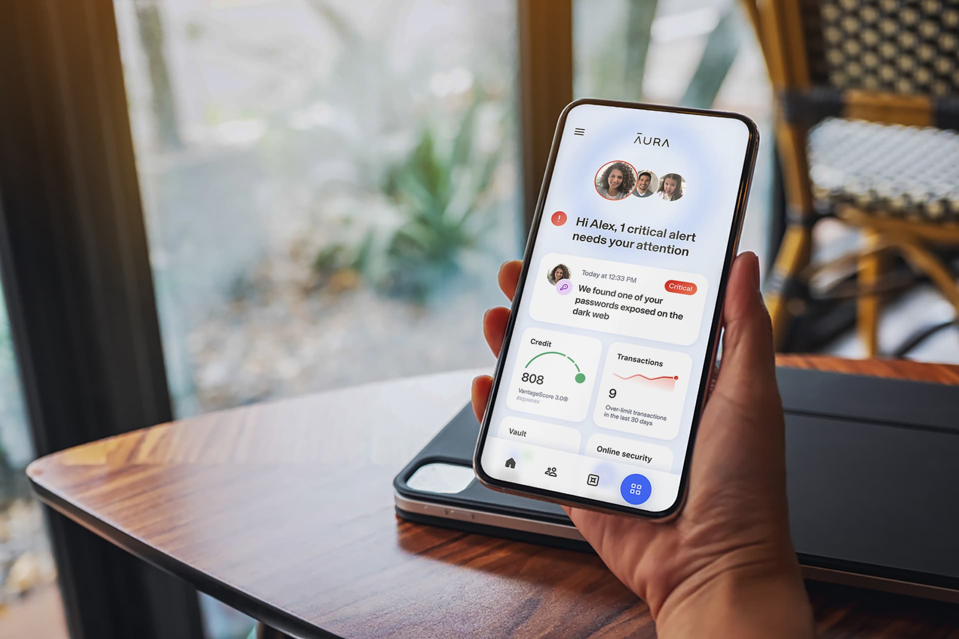 Person checking a real-time identity protection alert on their phone